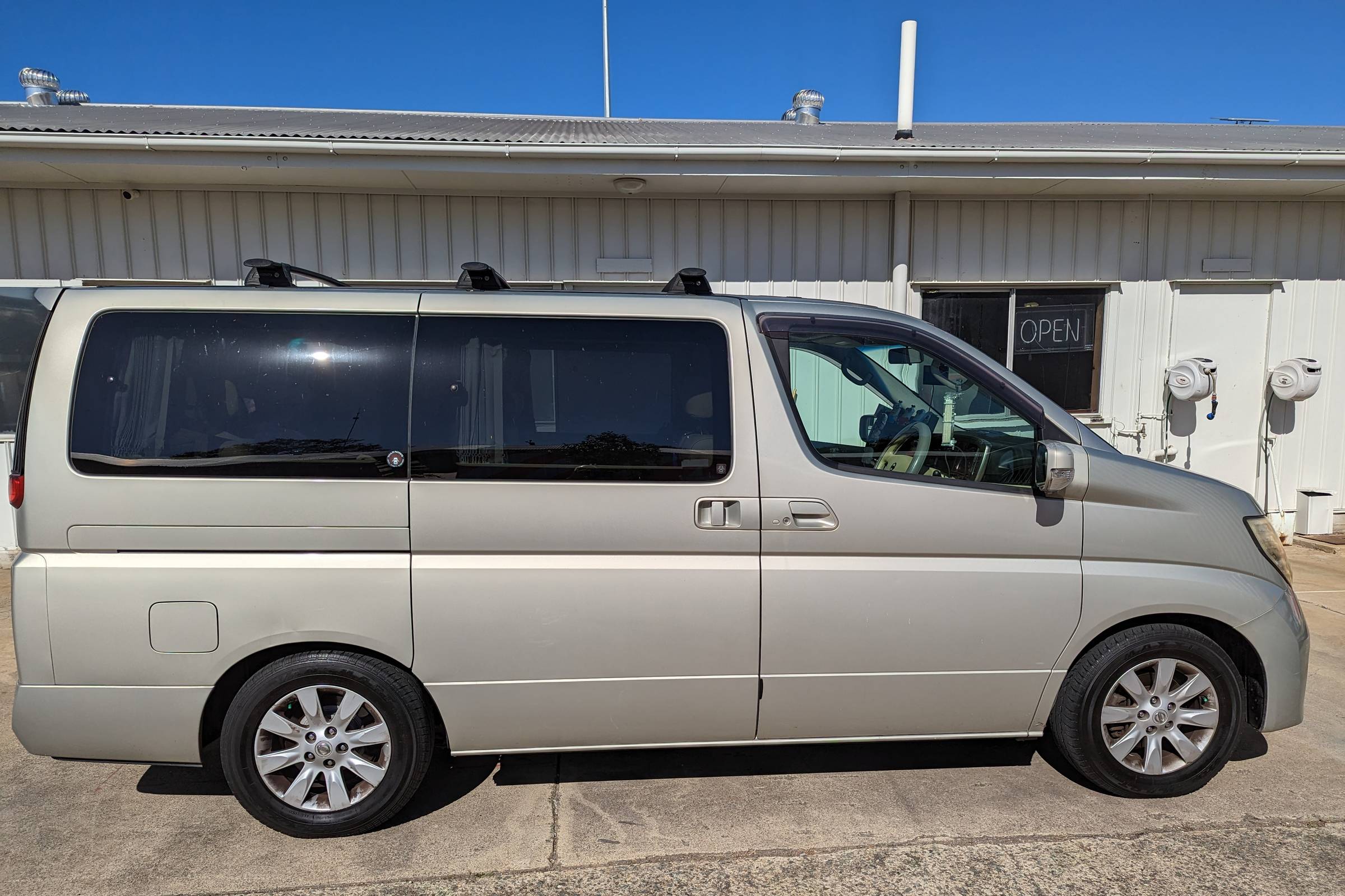 Side profile of Jacques Botte’s old Nissan Elgrand van, 2023.
