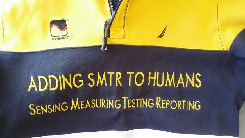 Jacques wearing a pullover printed with the slogan Adding SMTR to Humans.